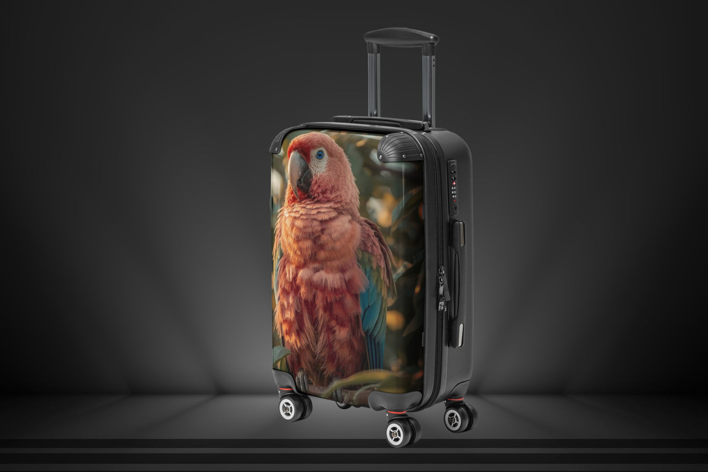 Hartschalenkoffer mit buntem Ara Papagei in linker Seitenansicht. Die Perspektive zeigt die Form des Koffers sowie das farbenprächtige Vogelmotiv mit Flamingo-, Orange- und Blautönen vor einer stimmungsvollen Naturkulisse.