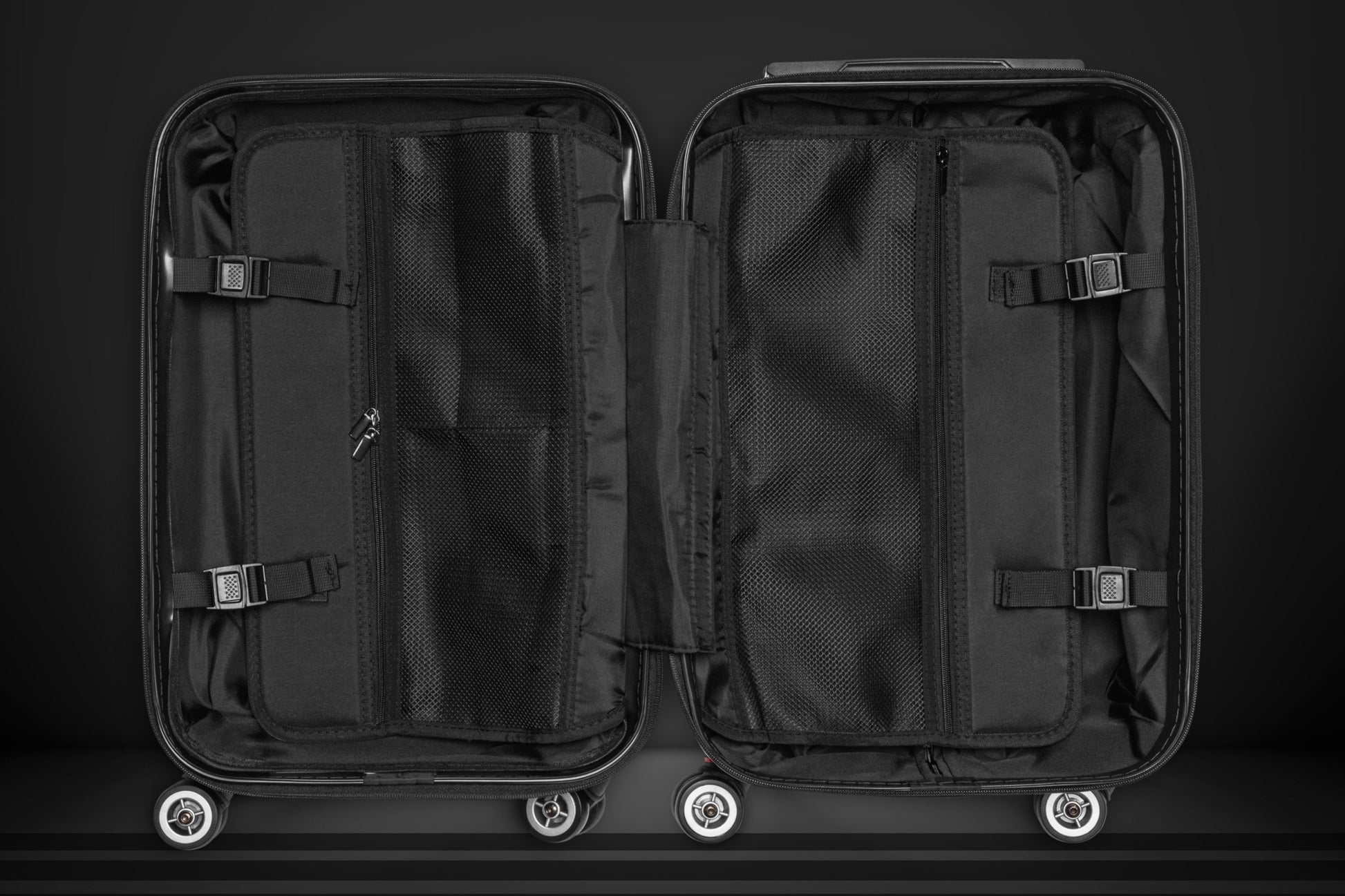 Geöffneter Hartschalenkoffer mit übersichtlich gestaltetem Innenraum, praktischen Organisationsfächern, Reißverschlussabtrennung und verstellbaren Packgurten für sicheres Reisen.