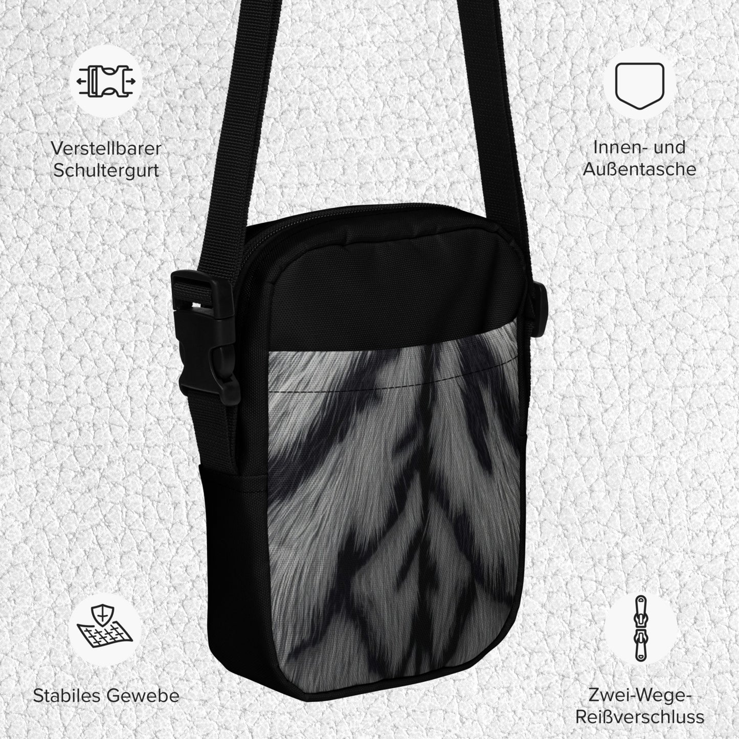 Produktdetails der weißen Tigerfell Crossbody Bag mit verstellbarem Schulterriemen, Innen- und Außentaschen sowie Zwei-Wege-Reißverschluss